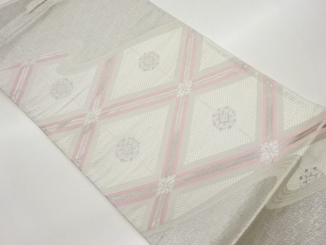 花菱に曲線模様織出し袋帯